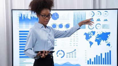 young-african-businesswoman-presenting-data-analysis-dashboard-tv-screen-modern-meeting-business-presentation-with-group-business-people-conference-room-concord_31965-241729